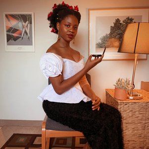 African hand made off-shoulder six pieces top.